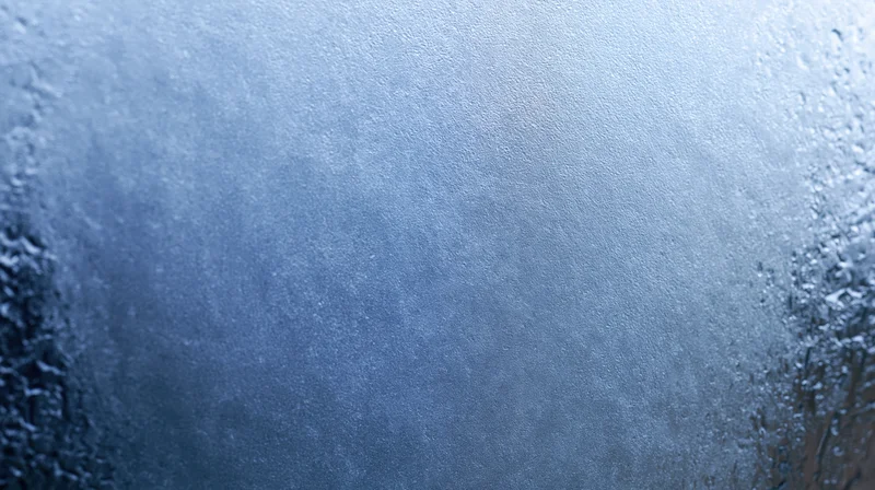 Close-up of fogged glass with water droplets and condensation