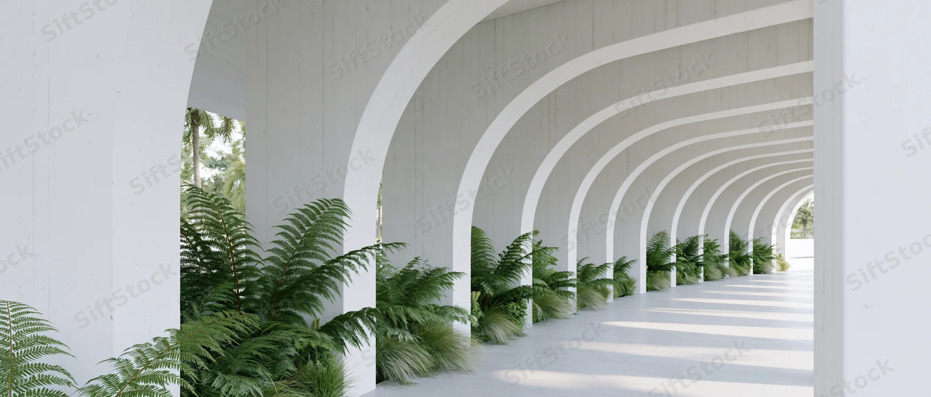 White concrete corridor with repeating arches and ferns along the sides