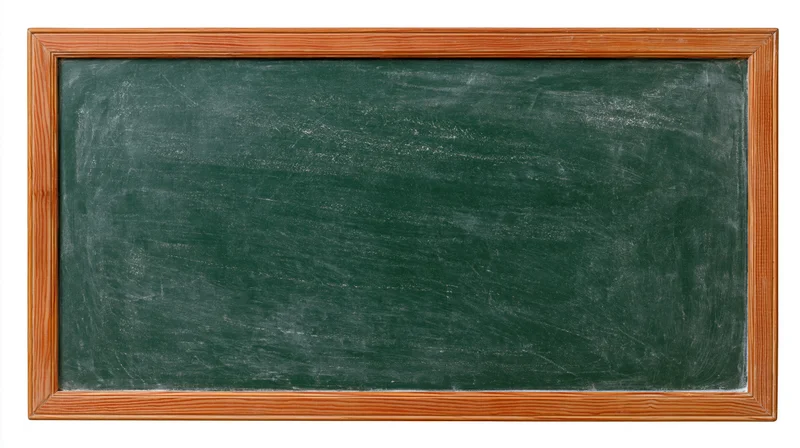 Empty green chalkboard with eraser smears in wooden frame on white background