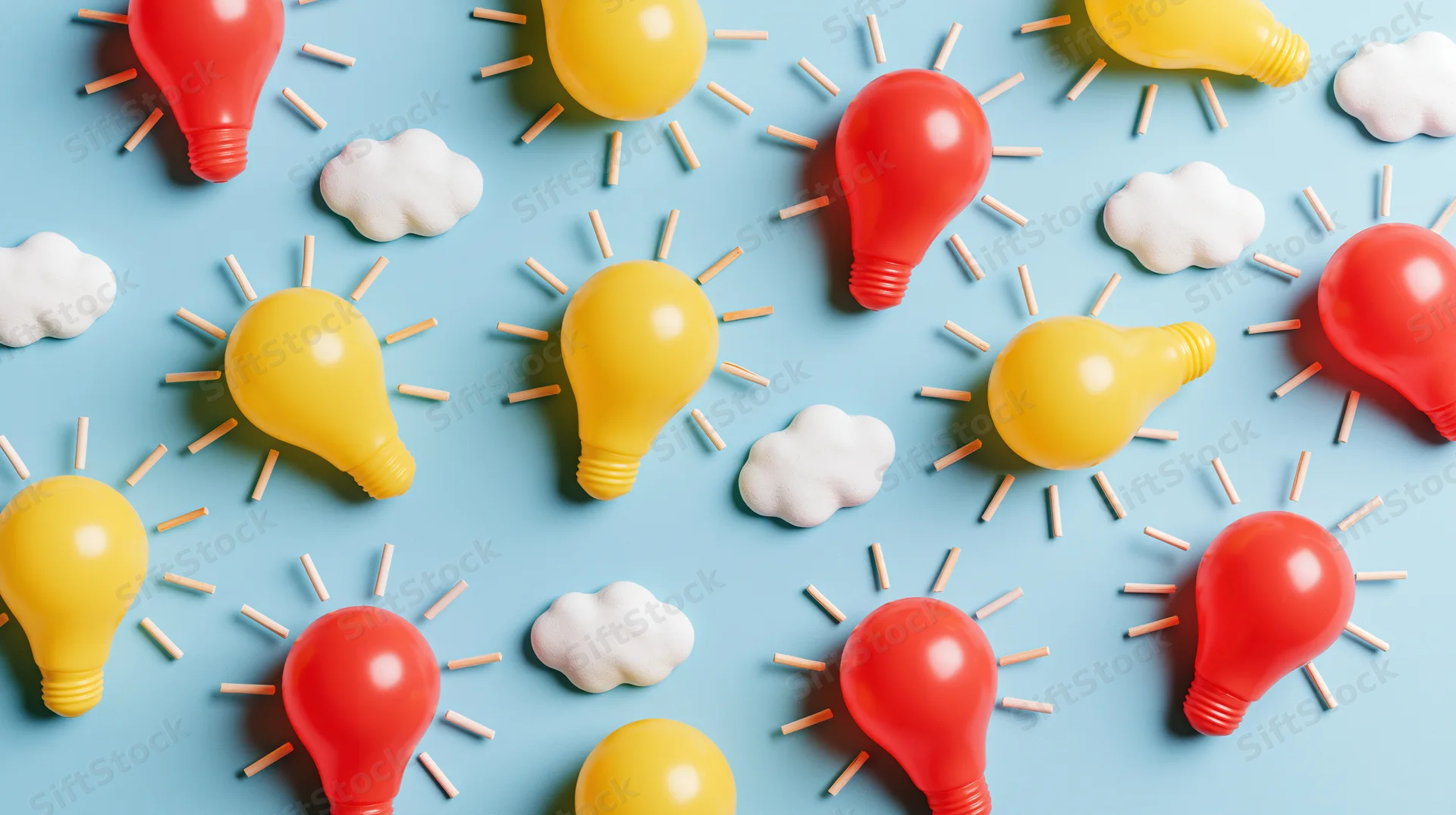 Flat lay of red and yellow plastic lightbulbs with toothpick rays and white clouds on blue background