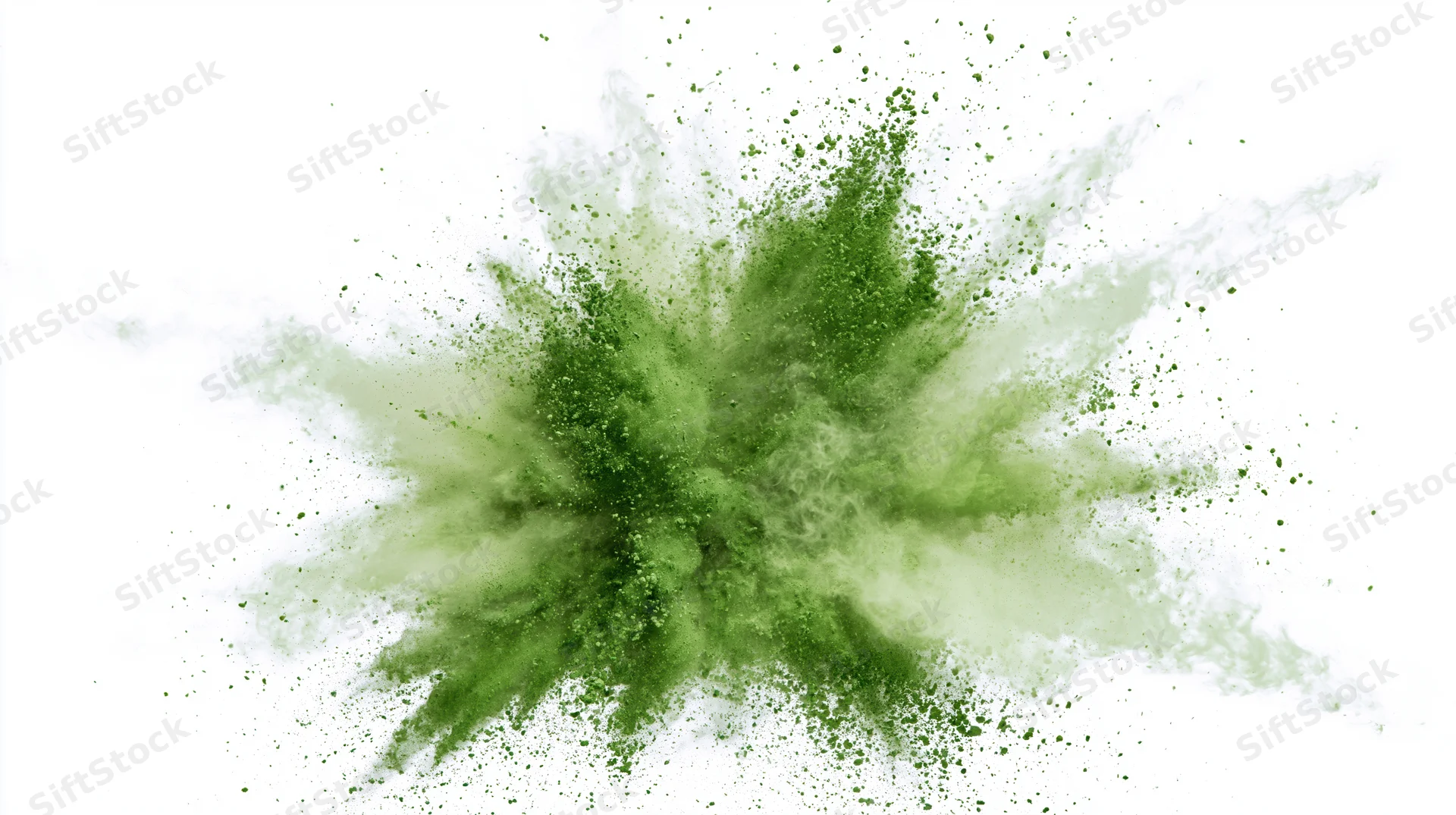 Green powder exploding outward in a burst against white background