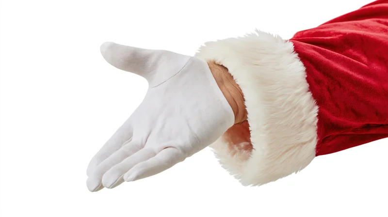 Santa's gloved hand extended palm down in red suit with white fur trim on white background
