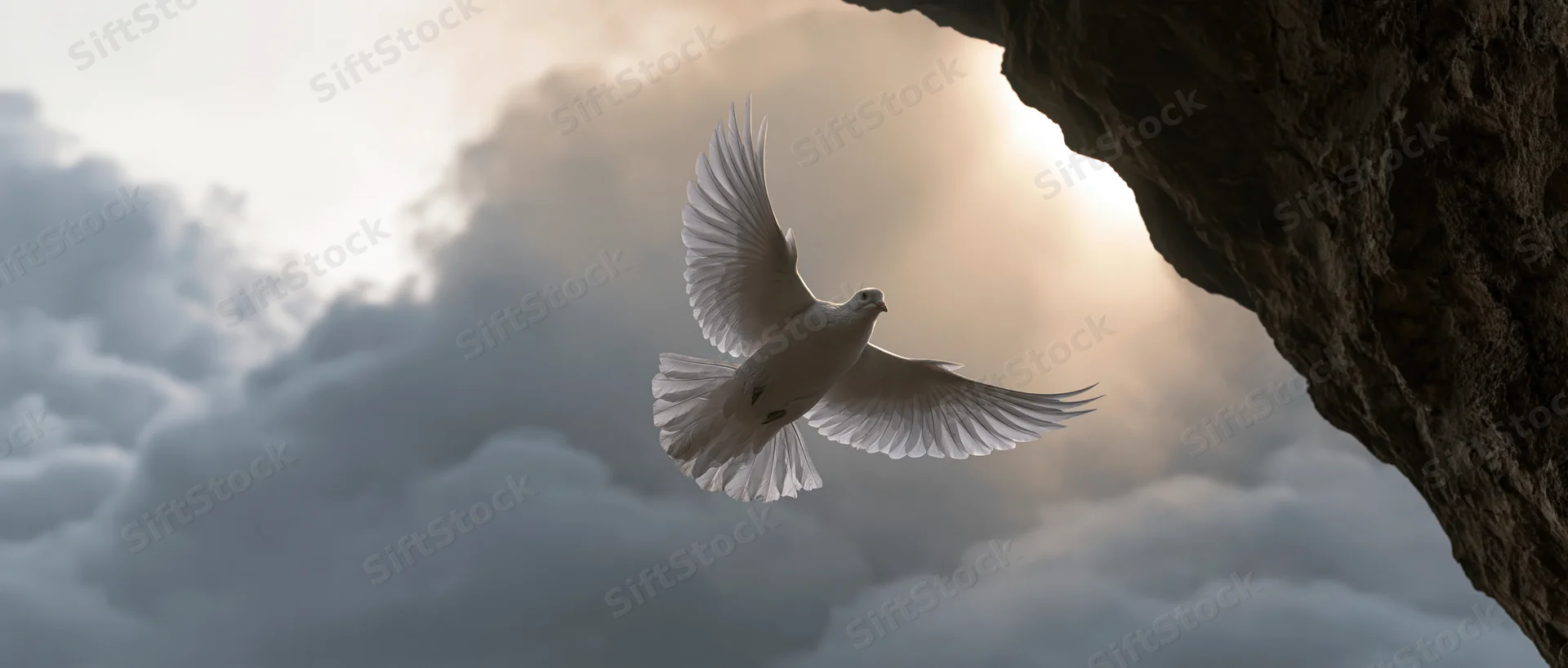 White dove in mid-flight with wings spread emerging from a rocky cave opening into a cloudy sky lit by sunlight