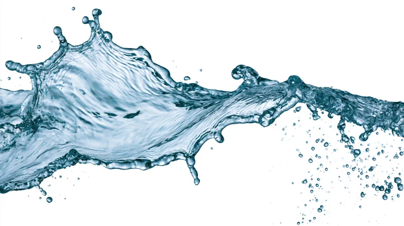 Dynamic water splash frozen mid-air flowing horizontally across white background