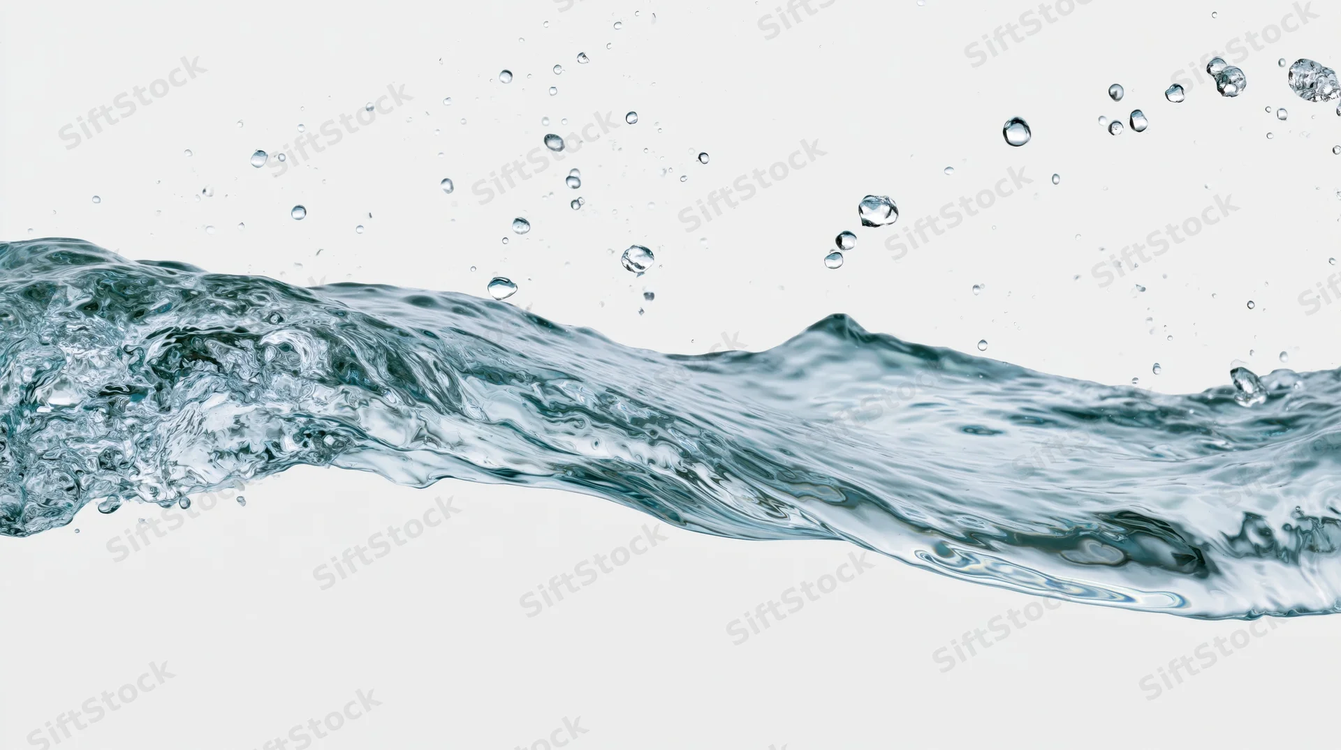Dynamic wave of clear water mid-splash with droplets rising against white background