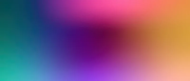 Smooth color gradient transitioning from teal to pink to orange across the frame