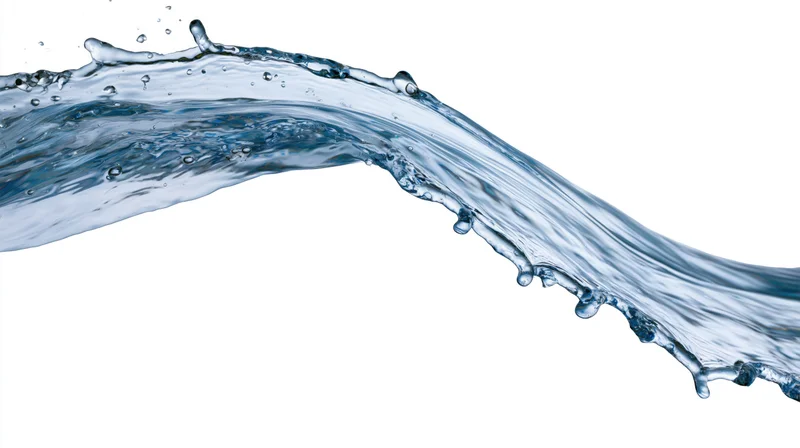 A flowing arc of clear blue water mid-splash curving in a smooth arc against white background