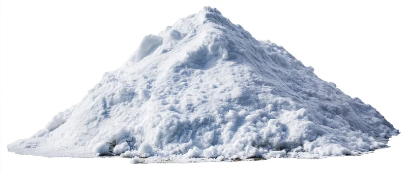 Large mound of shoveled snow on flat surface isolated on white