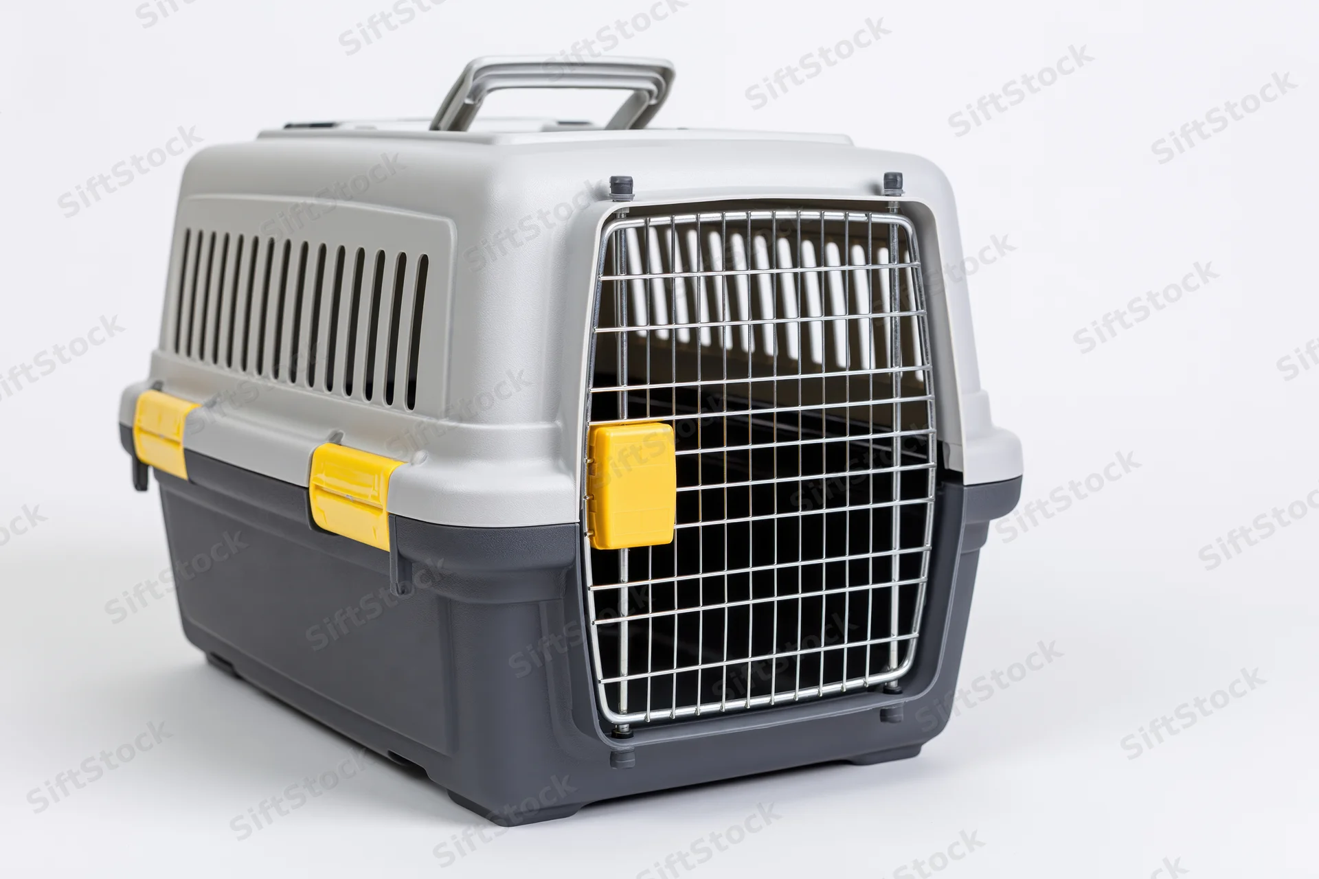 Plastic pet travel carrier with metal wire door and yellow latches on white background