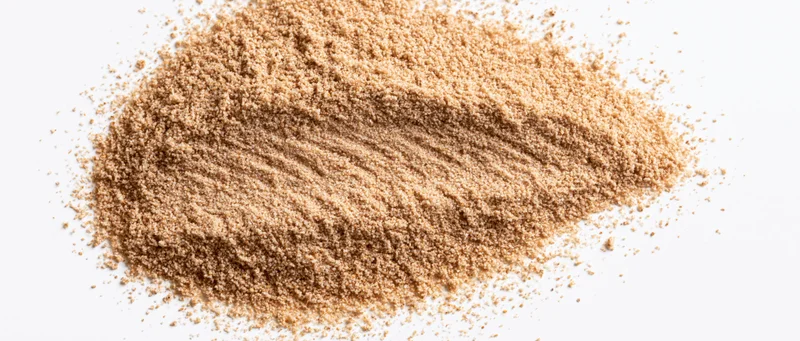 Fine desert sand piled flat on white background