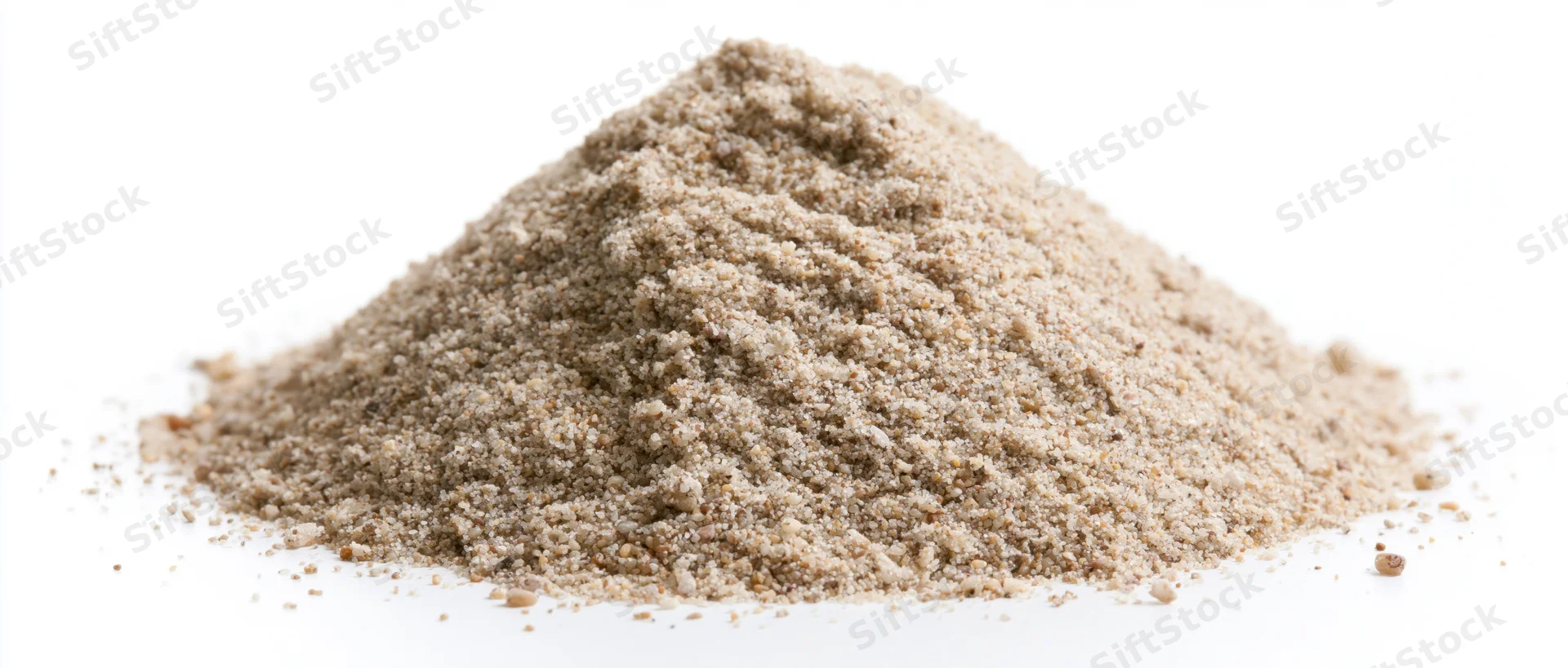 A pile of dry beach sand on a white background