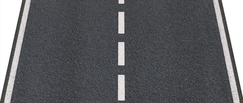 Straight asphalt road strip with white dashed centerline and solid edge lines on white background