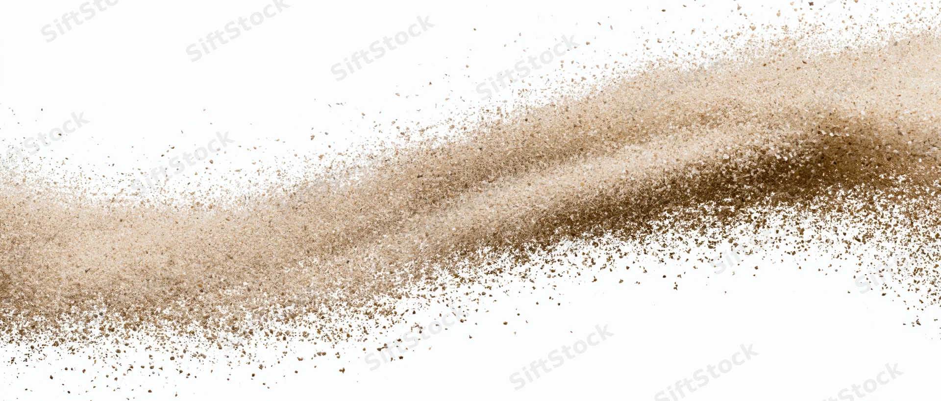 Wave of fine desert sand exploding mid-air scattered particles against white background