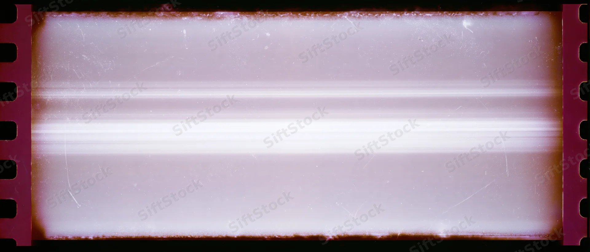 Overexposed 35mm film frame with light leak and damage showing blank white area and perforated edges
