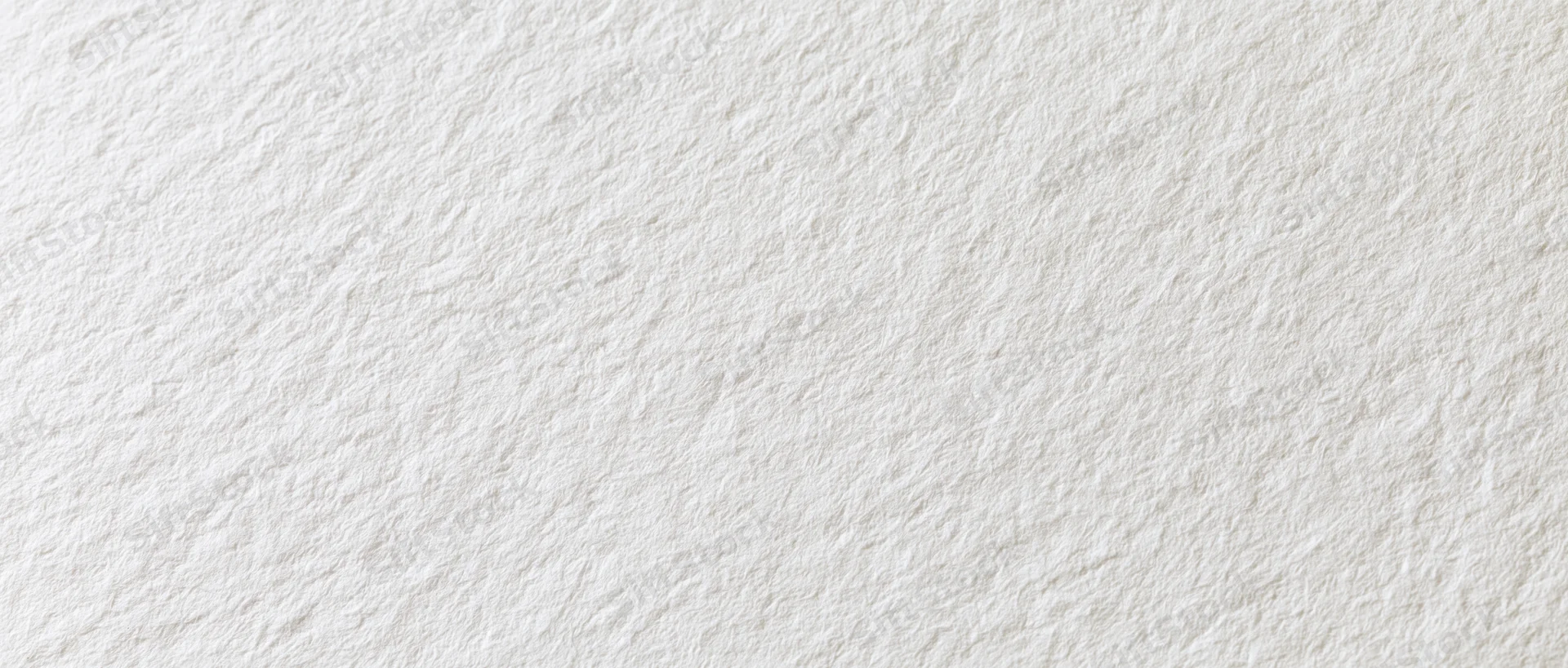 Close-up of white textured paper surface in flat lay arrangement