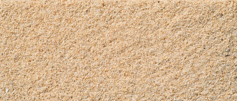 Closeup of dry beach sand filling the frame