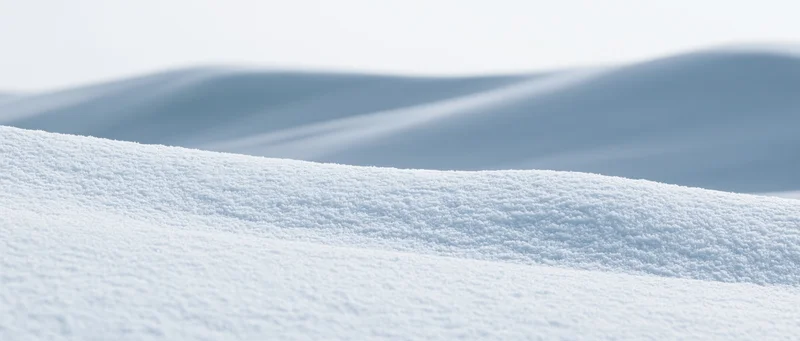Close-up of undulating snow drifts in a winter landscape
