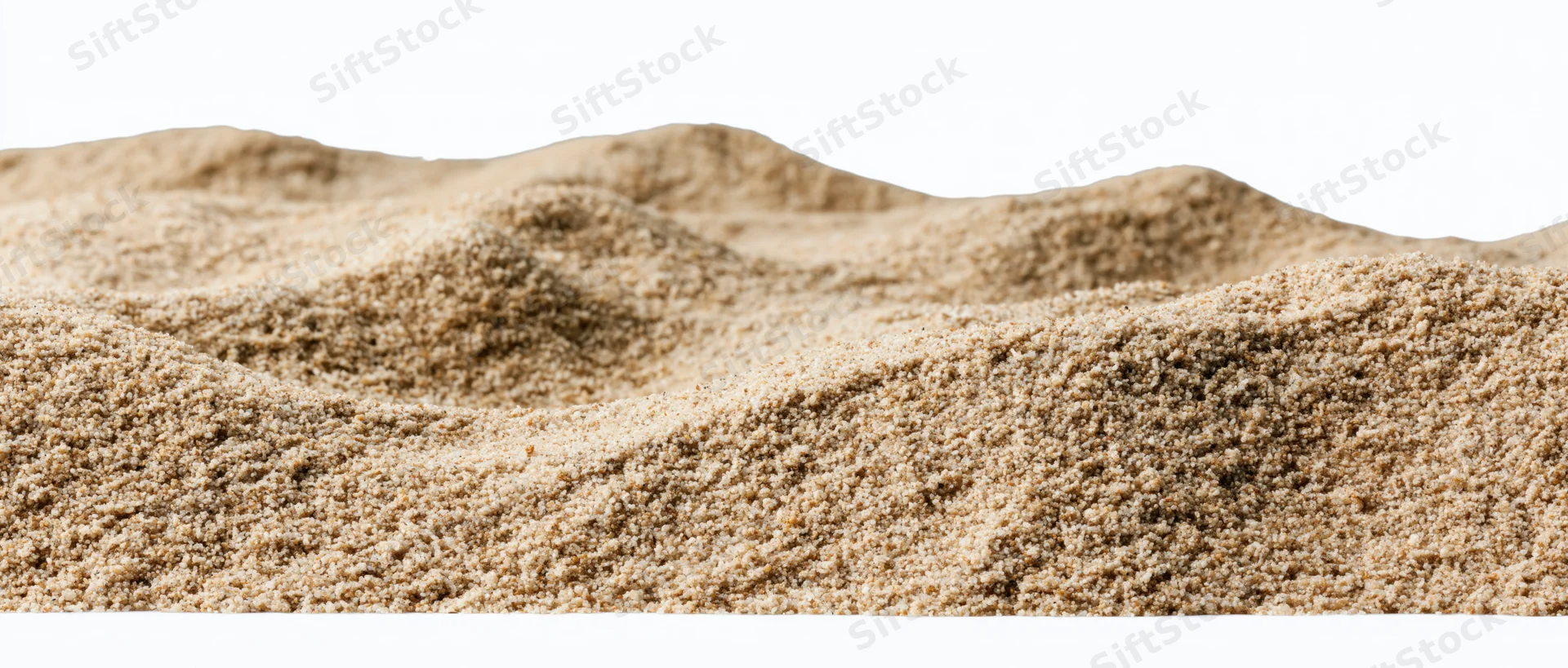 Close-up of small dry sand mounds with gently rolling surface on white background