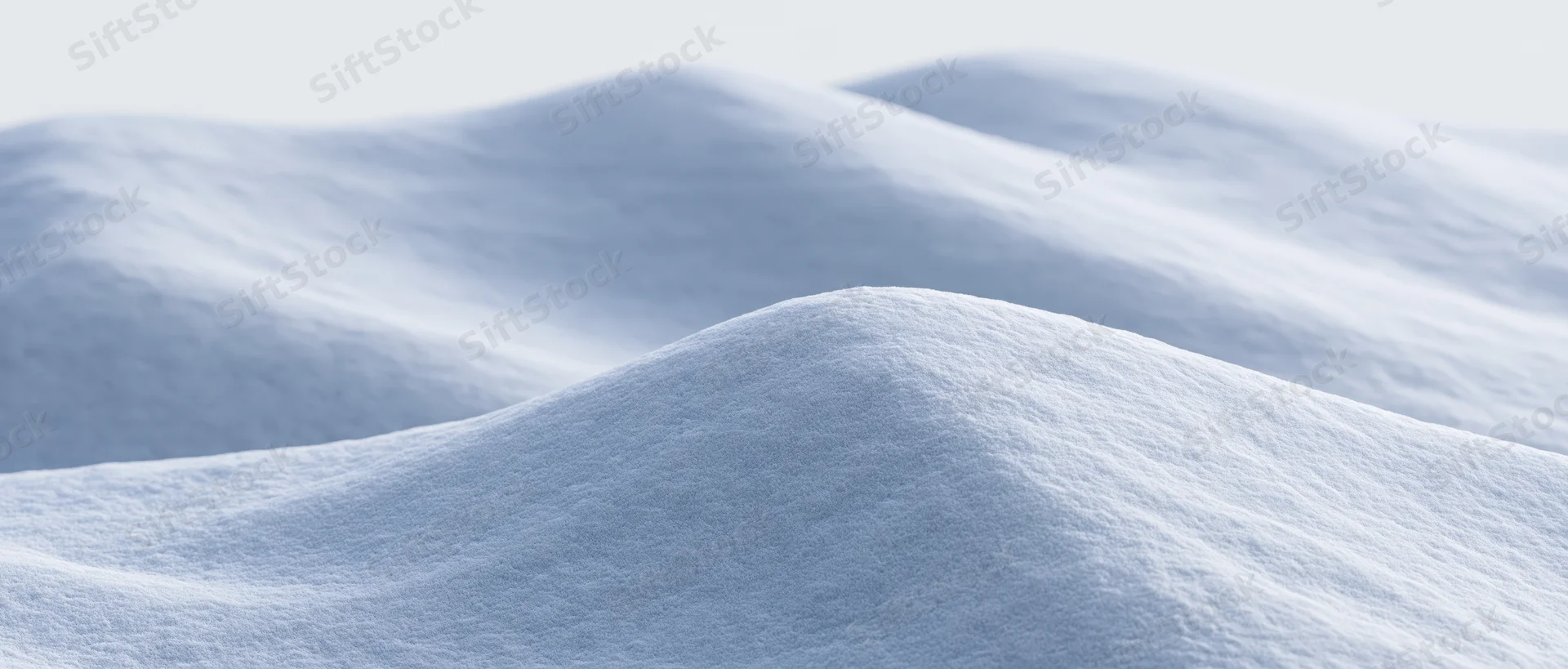 Smooth undulating snow surface in a wide panoramic closeup