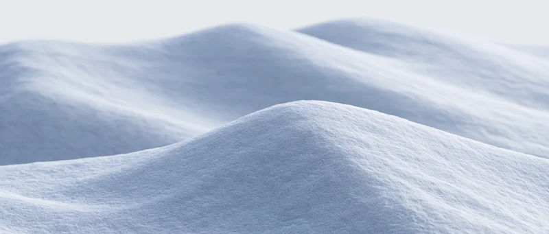 Smooth undulating snow surface in a wide panoramic closeup