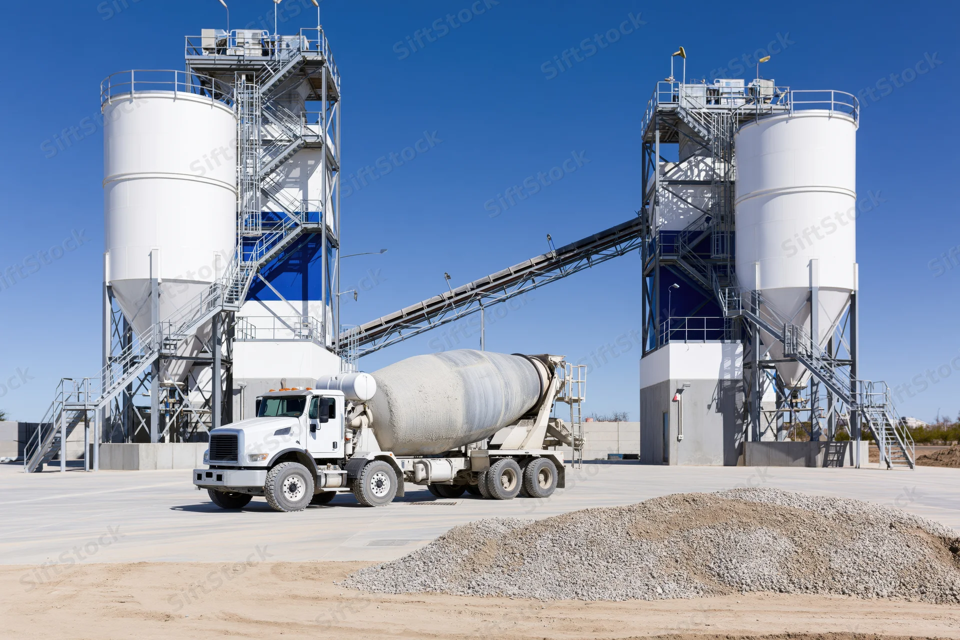 Concrete mixer truck parked at cement batching plant facility