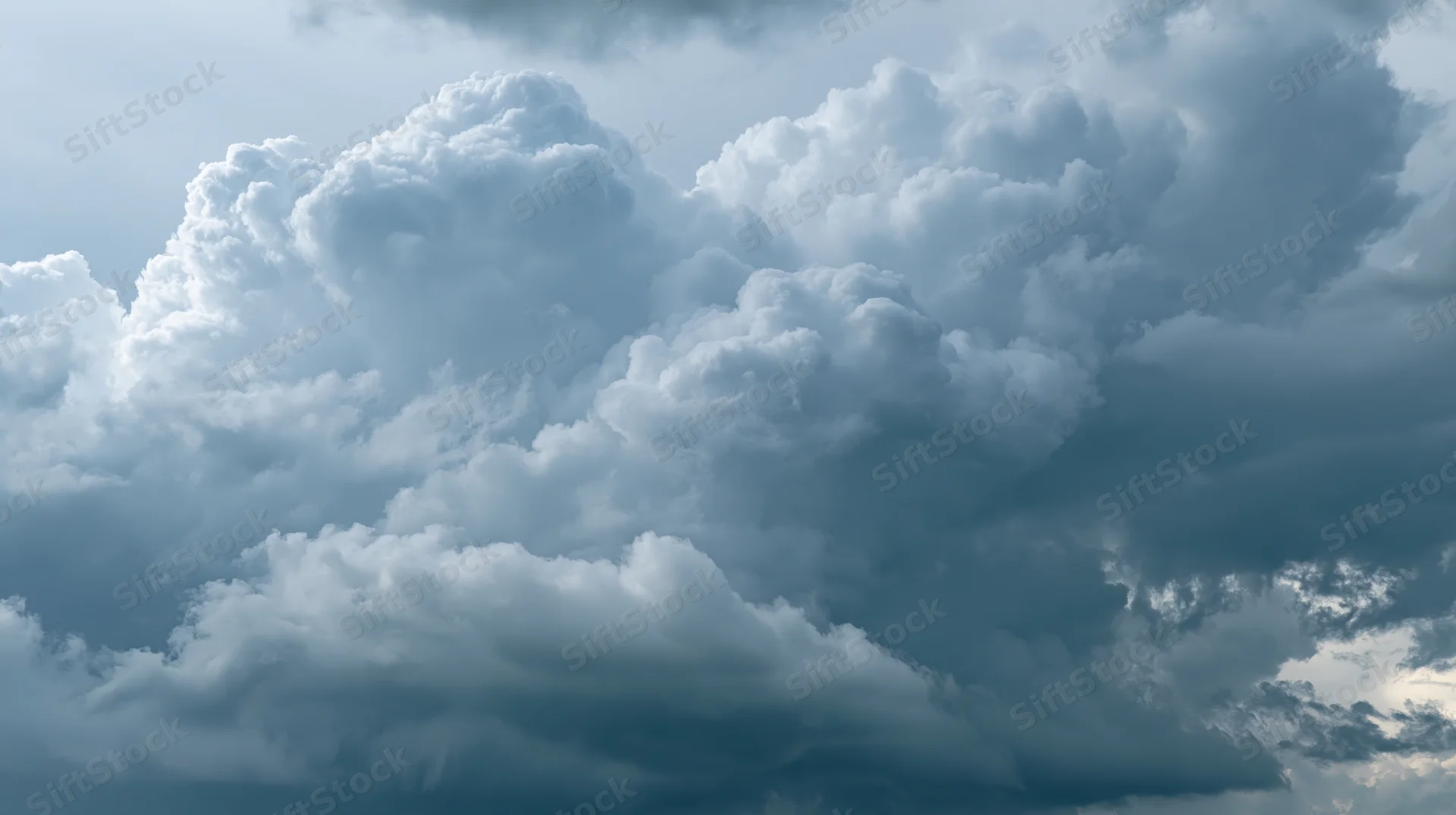 Dramatic storm clouds billowing across the sky