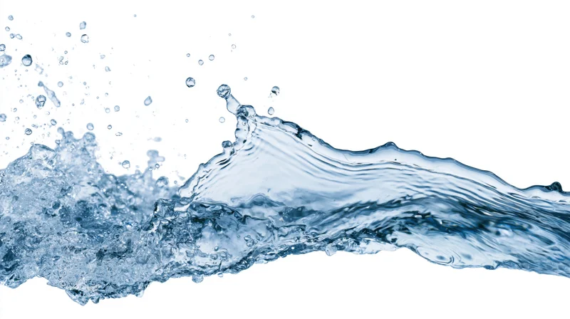 Dynamic water splash frozen mid-motion against clean white background
