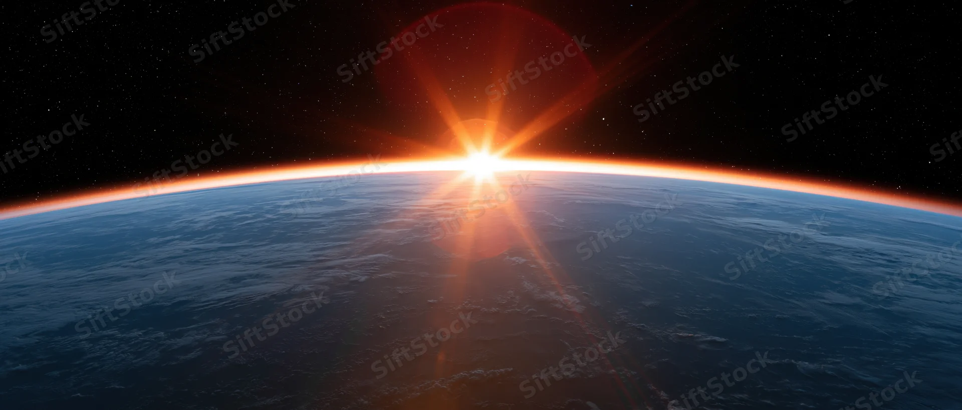 Earth's curved horizon from low orbit with sunrise glowing along the edge