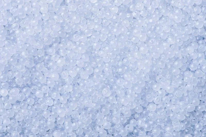 Close-up of translucent white plastic beads filling the frame