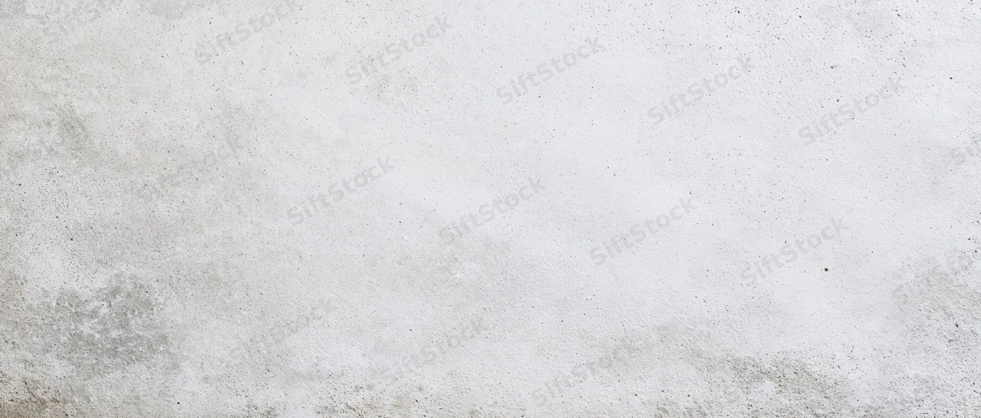 Close-up of a smooth gray concrete wall surface