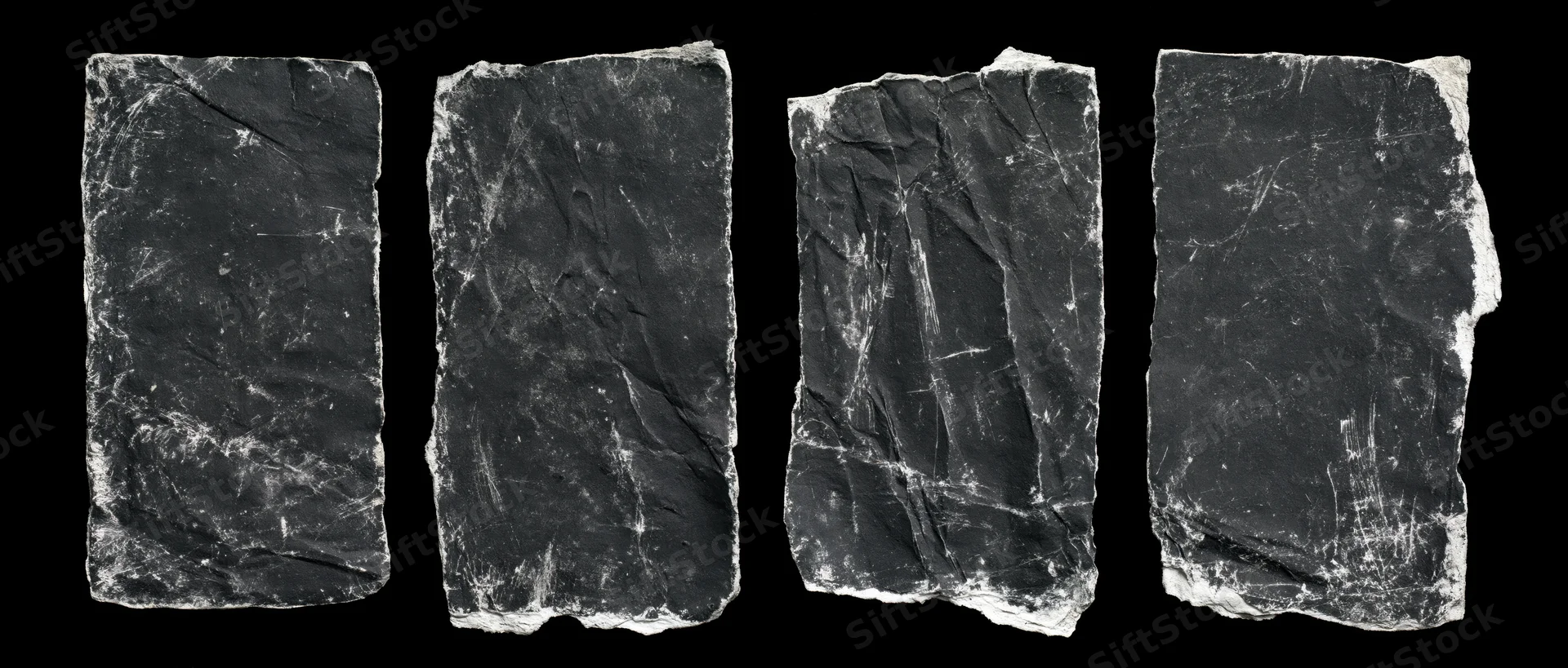Four slate slabs arranged side by side against black background