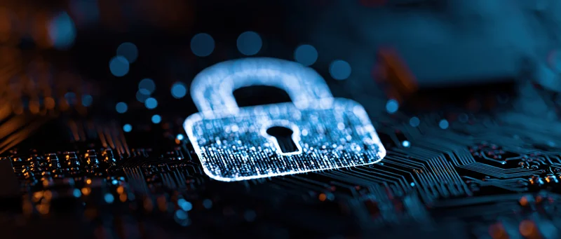 Glowing padlock icon centered on dark circuit board surface