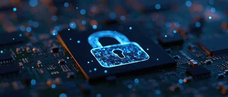 Glowing padlock icon on dark circuit board surface