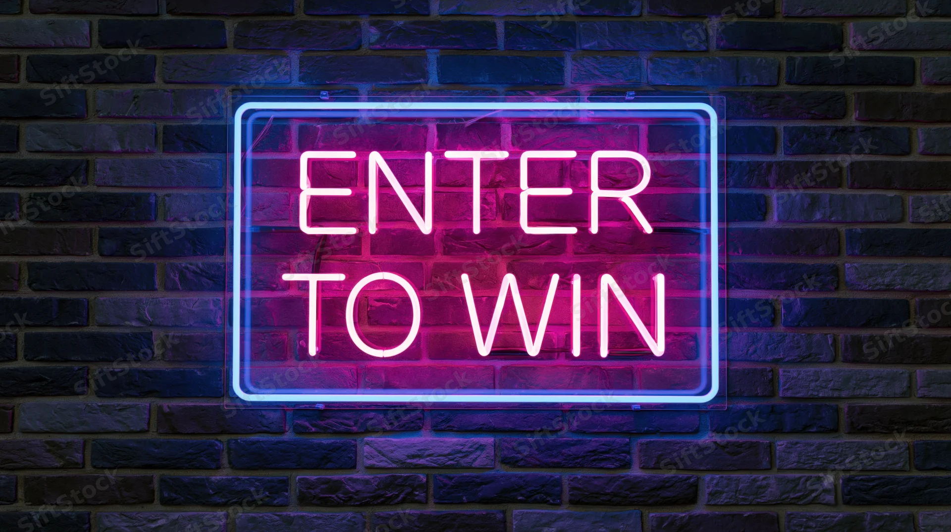 Neon sign reading enter to win mounted on a brick wall