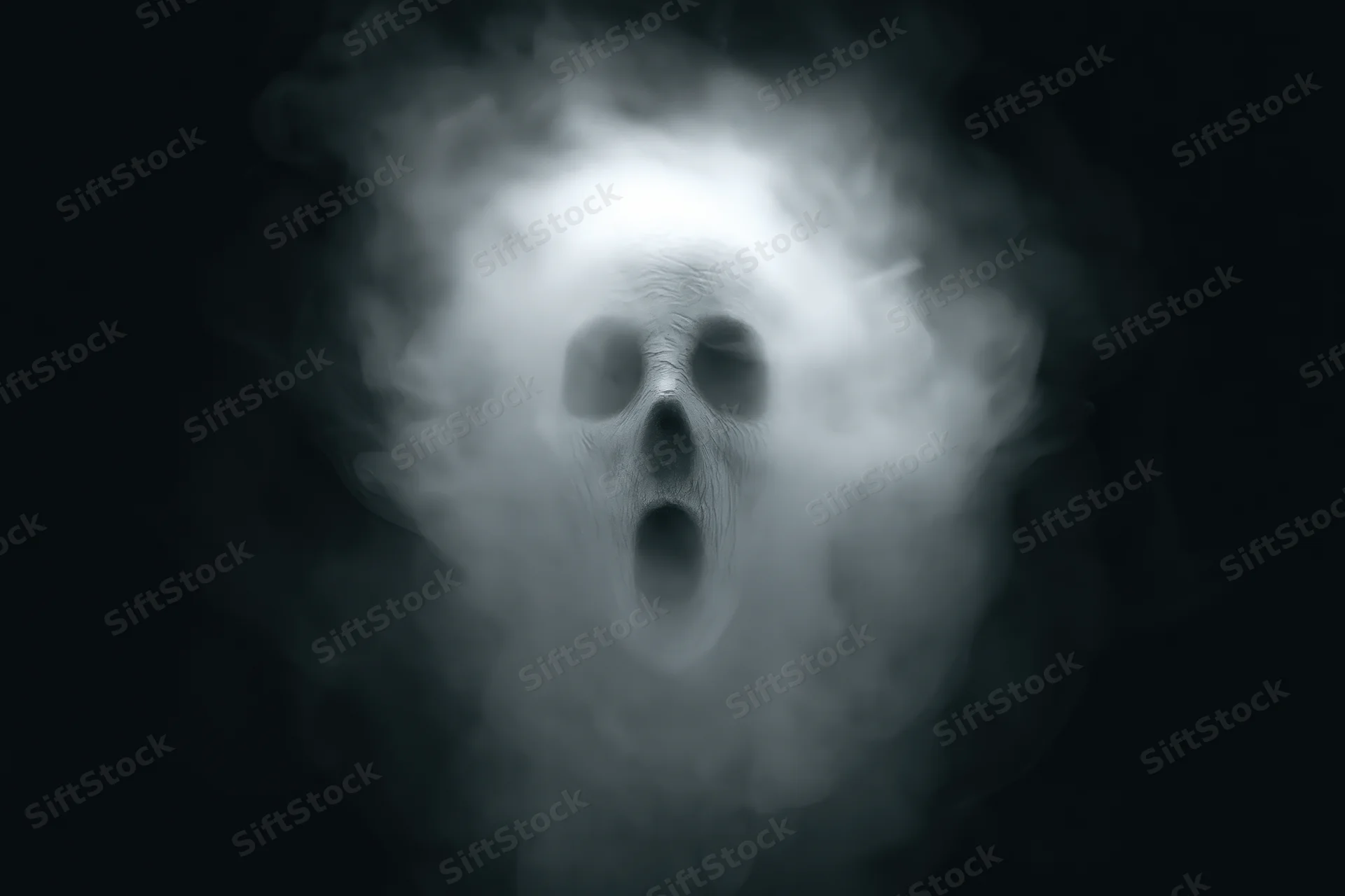 Ghostly screaming face emerging from swirling white smoke in dark space