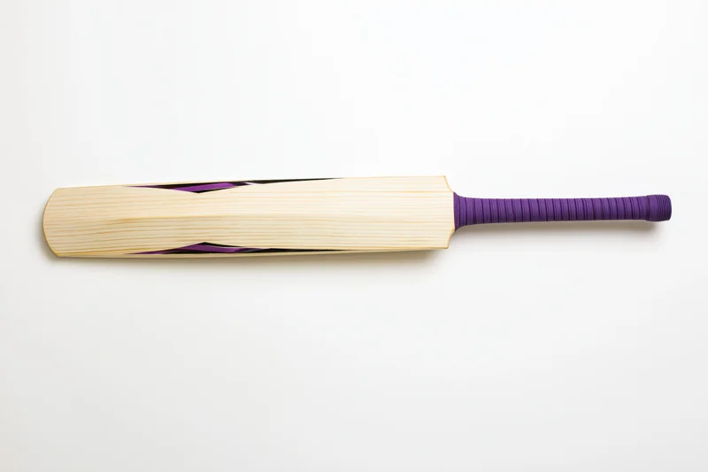Cricket bat lying flat in side profile on white background