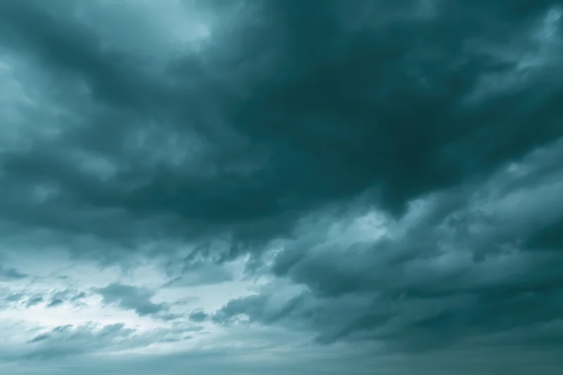 Dramatic overcast sky filled with layered cumulus and stratus clouds