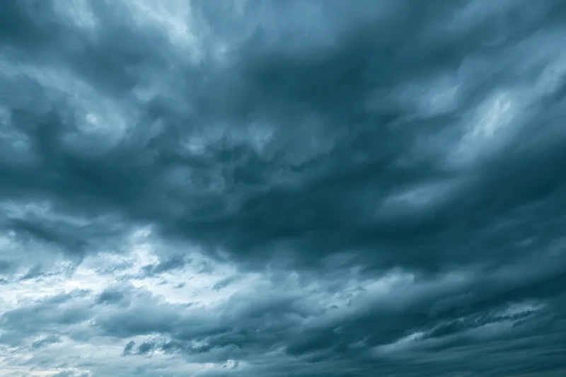 Dramatic overcast sky filled with layered cumulus and stratus clouds