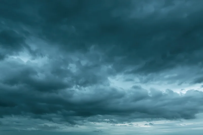 Dramatic overcast sky filled with layered cumulus and stratus clouds