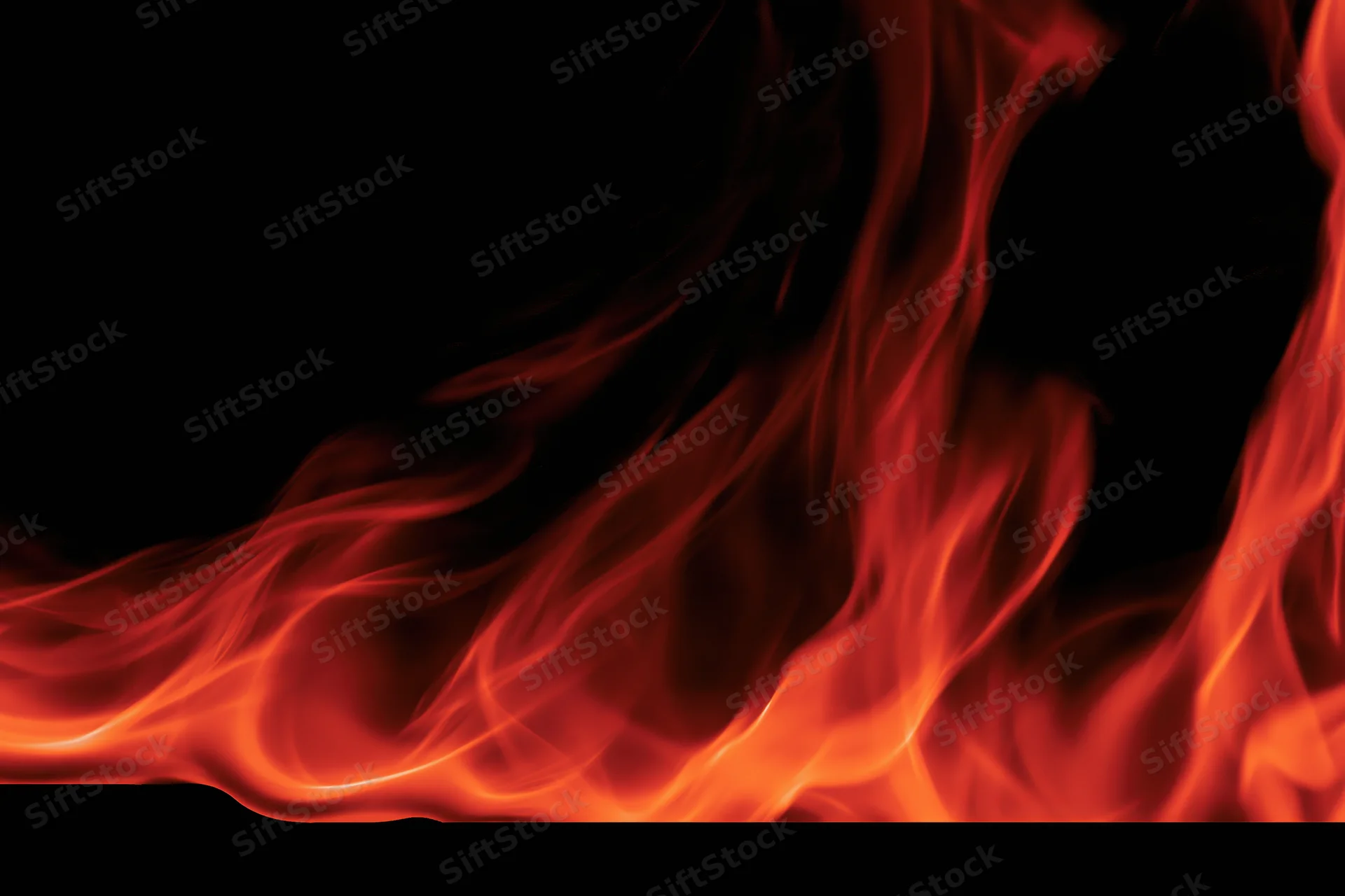 Red and orange flames curving along the bottom edge of the frame against a black background