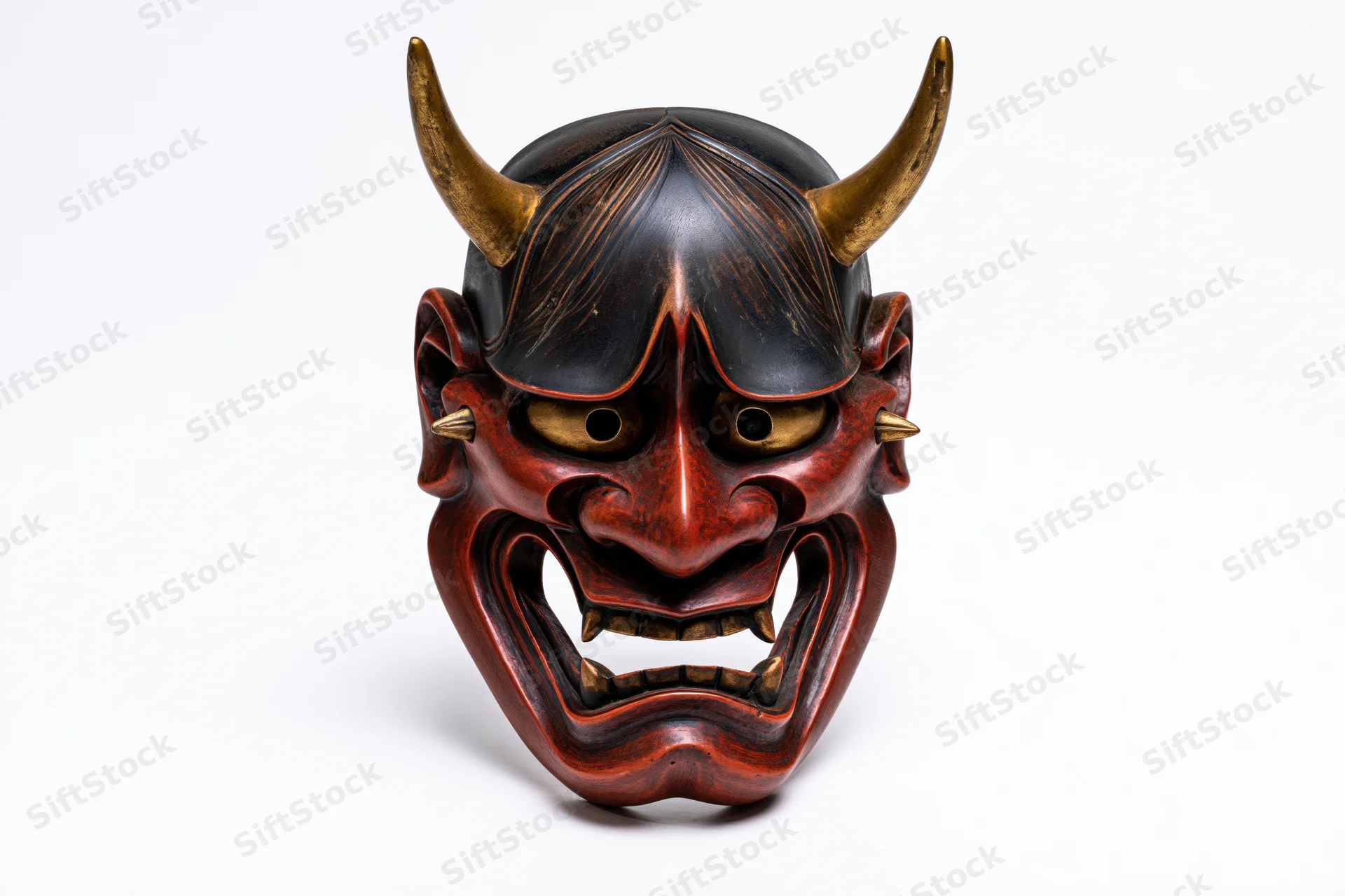 Traditional japanese hannya demon mask displayed face-forward on white background