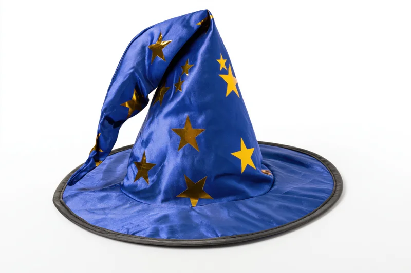 Blue wizard hat with gold stars on white background