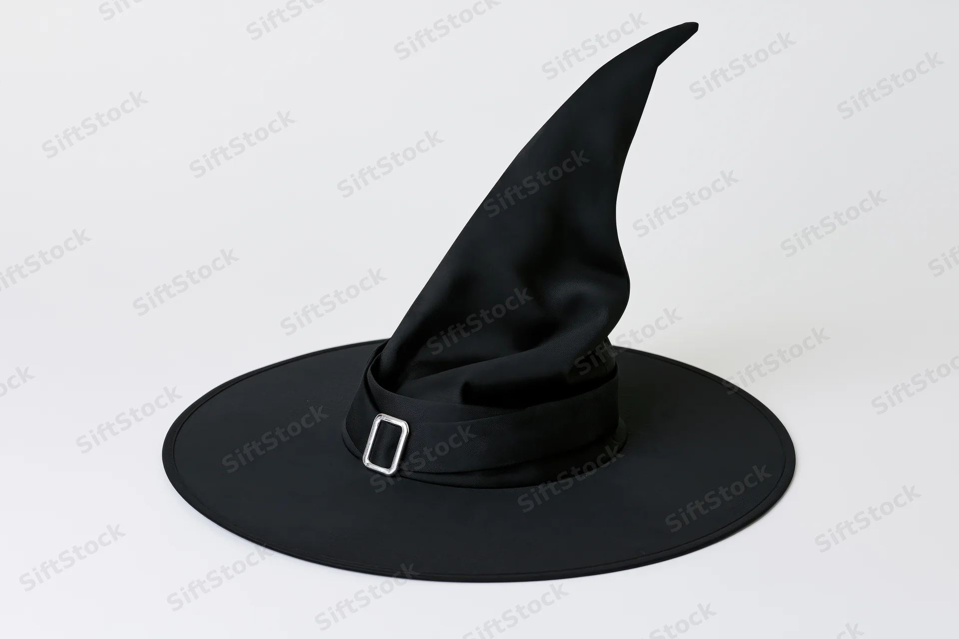 Black witch hat with tall pointed crown and wide brim on white background