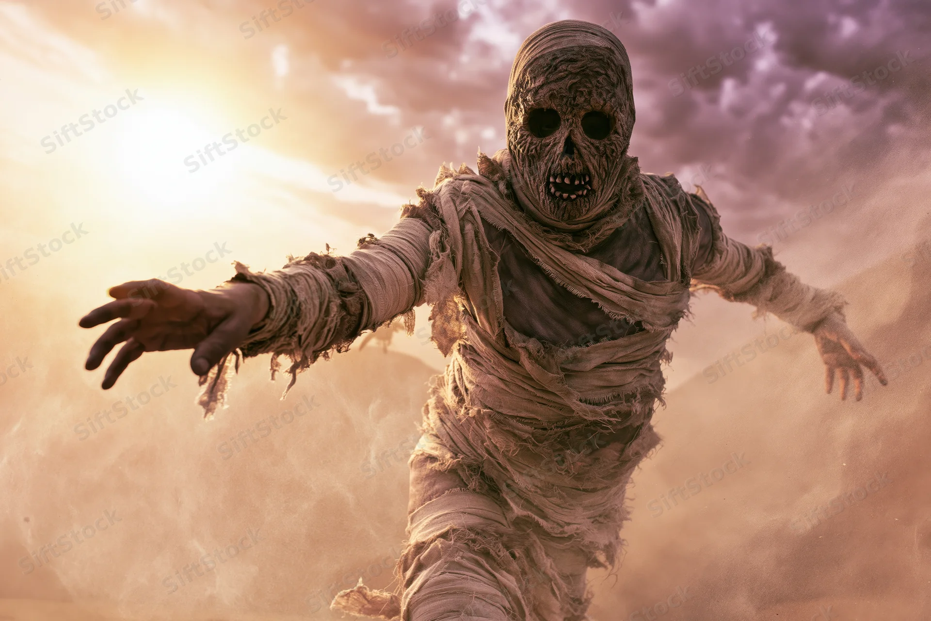 Mummy in costume lunging forward with arms outstretched in desert at sunset