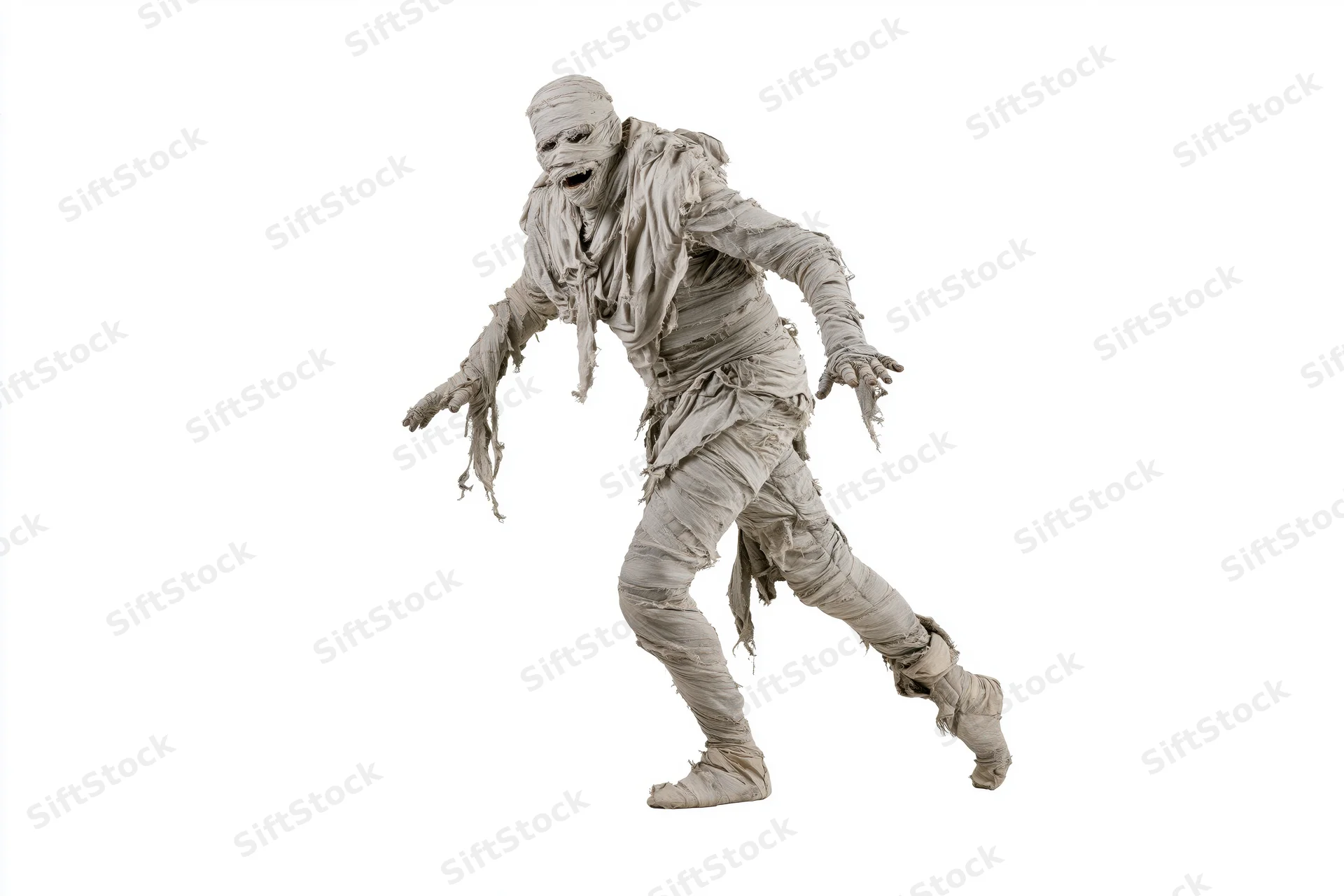 Costumed mummy performer lurching forward with arms outstretched against white background
