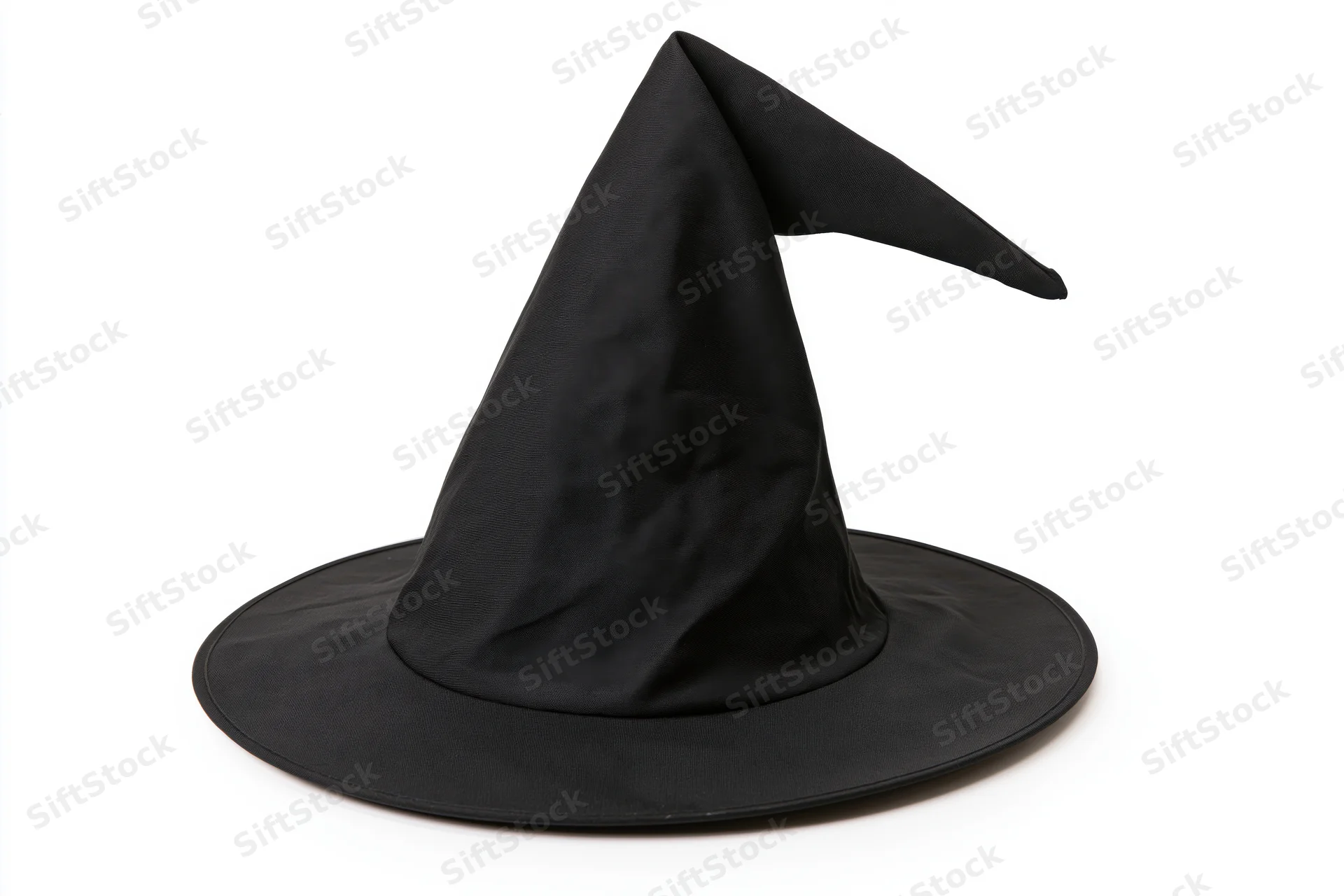 Black witch hat with tall pointed crown and wide flat brim isolated on white