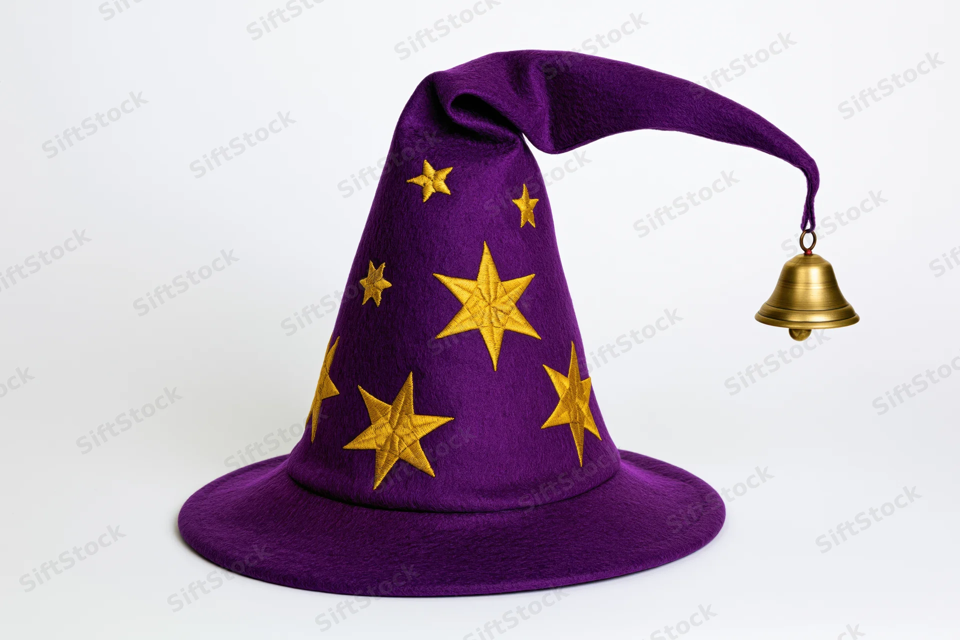 Purple felt wizard hat with gold stars and bell on curved brim isolated on white background
