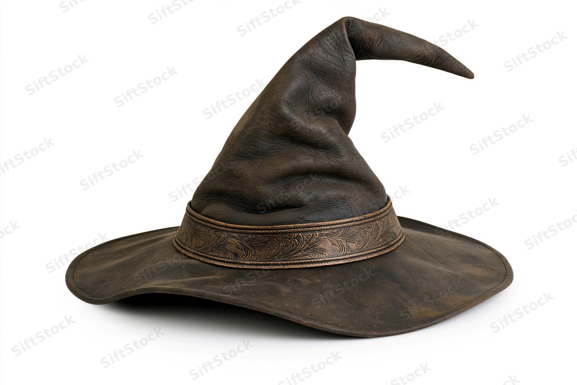 Worn leather witch hat with crooked peak and wide brim on white background