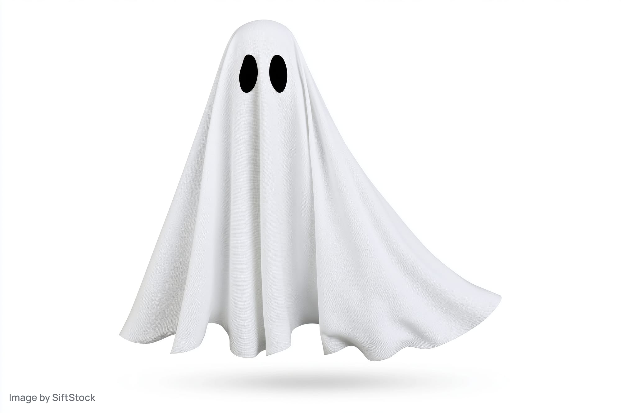Floating ghost costume made from white sheet with black eye holes isolated on white background