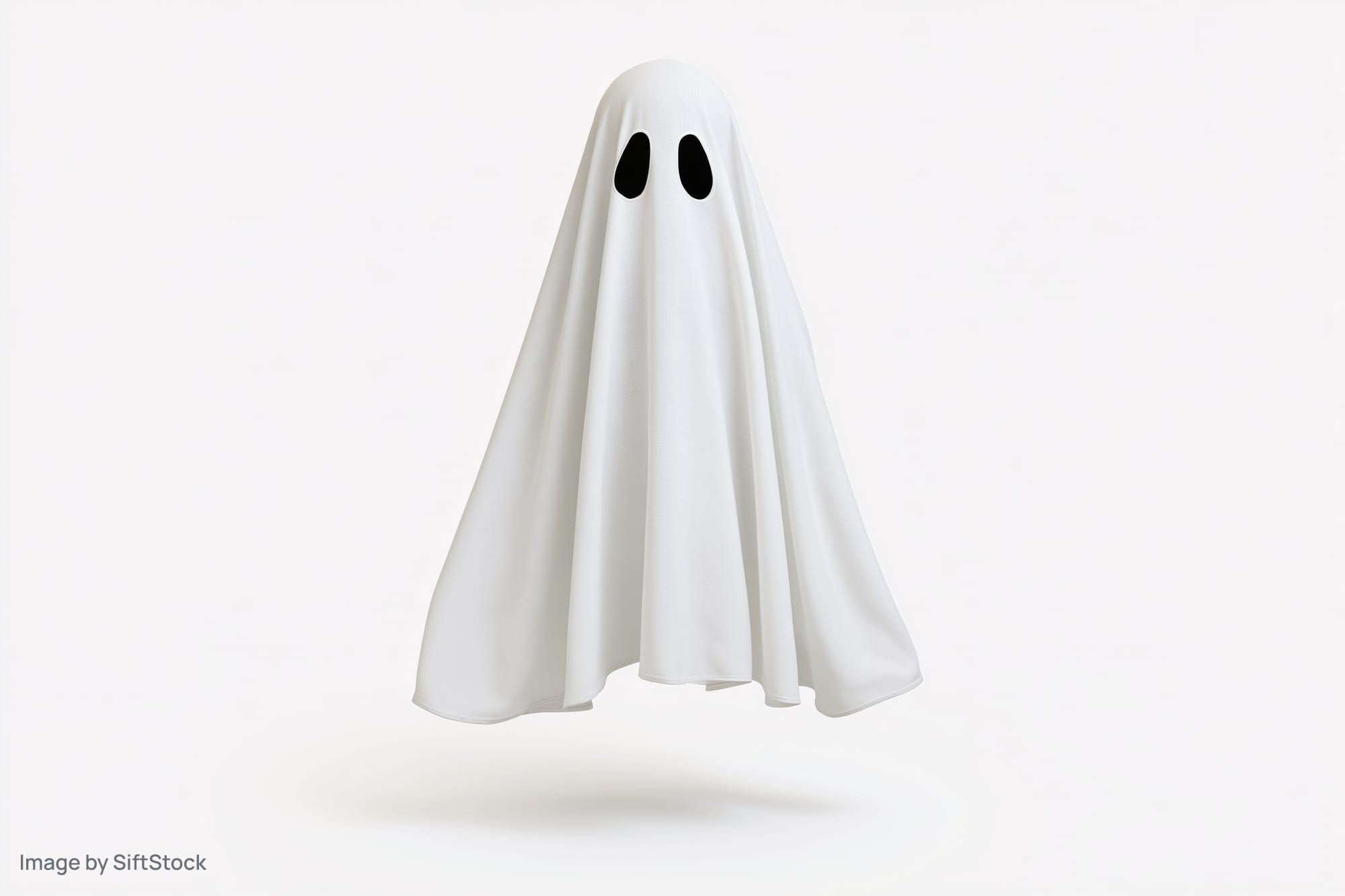 White sheet ghost costume floating against plain white background